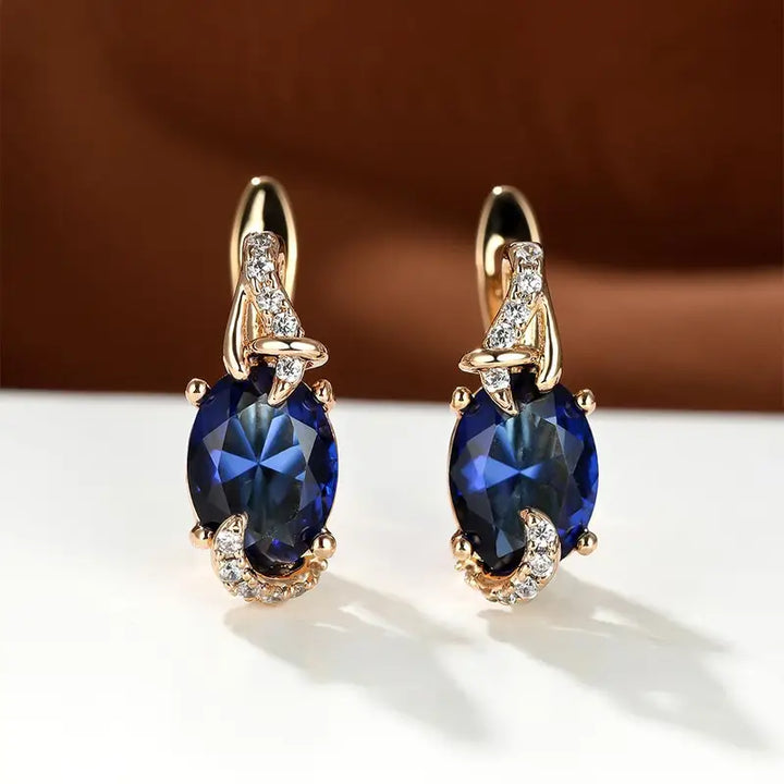 Deslumbrantes Brincos de Ouro com Safira