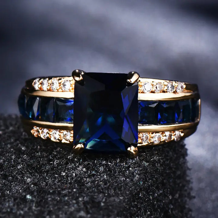 Anel Dourado Azul Profundo Distinto