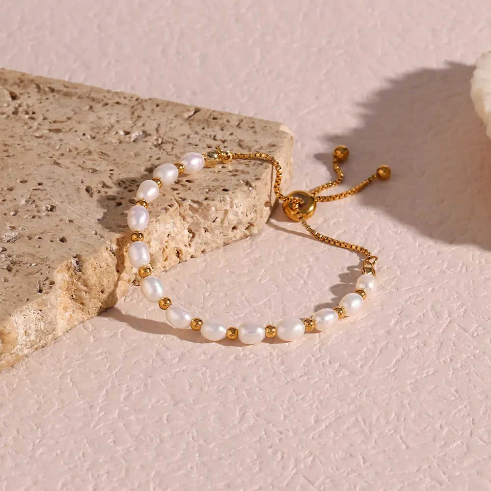 Pulseira Elegante de Pérolas e Ouro