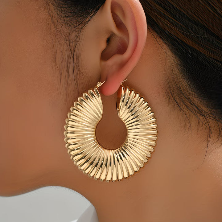 Brincos Sunburst Leves e Ousados