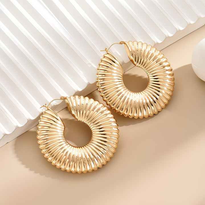 Brincos Sunburst Leves e Ousados