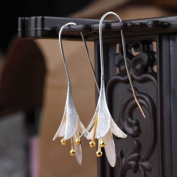 Brincos de Flor Prateada
