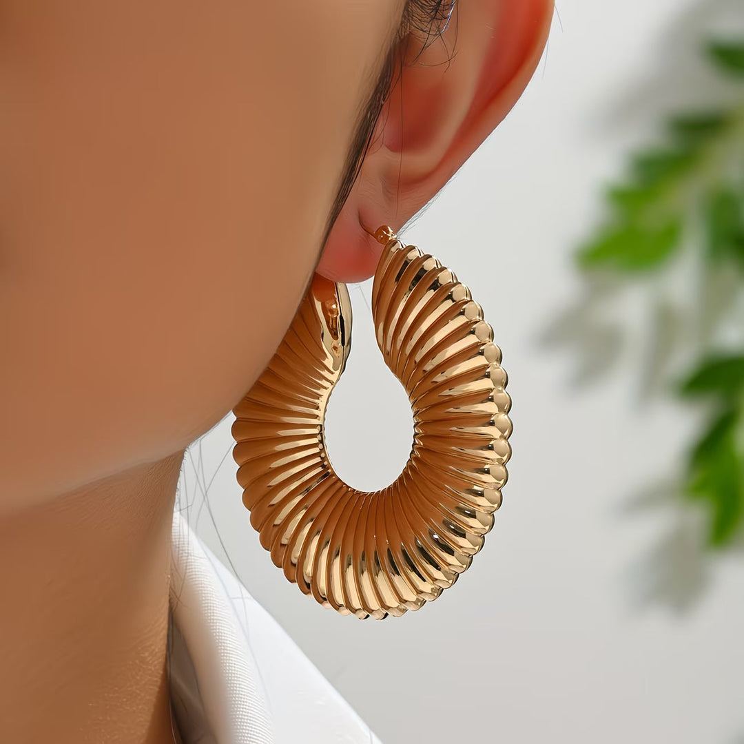 Brincos Sunburst Leves e Ousados