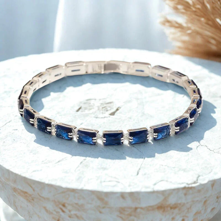 Pulseira Torcida de Prata com Safira Moderna