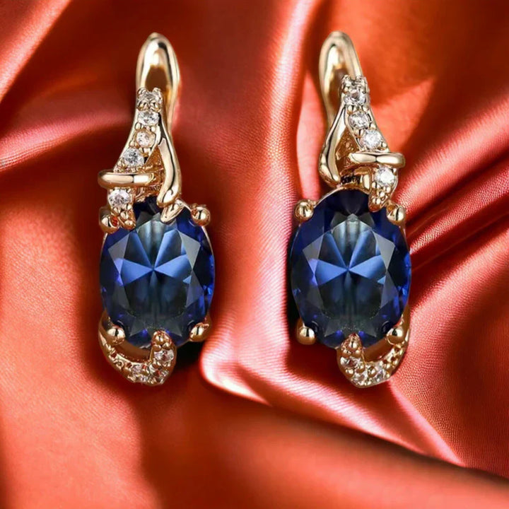 Deslumbrantes Brincos de Ouro com Safira