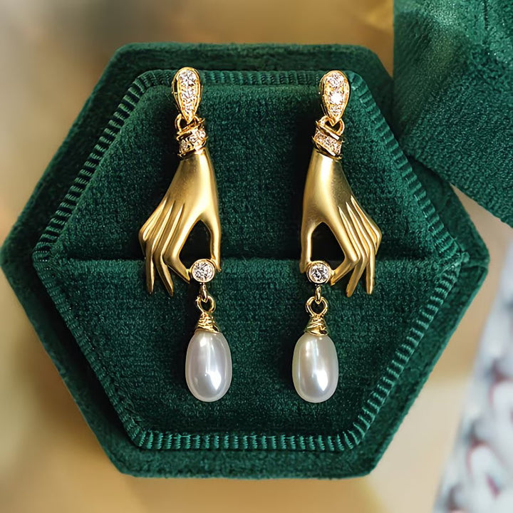 Brincos de Pérola com Design Elegante