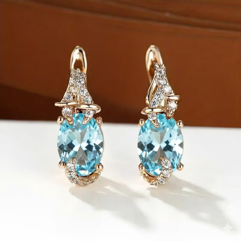 Deslumbrantes Brincos de Ouro com Safira